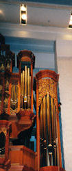 Raising large carving, Fritts pipe organ, Pacific Lutheran University, Tacoma WA, wood carver Jude Fritts